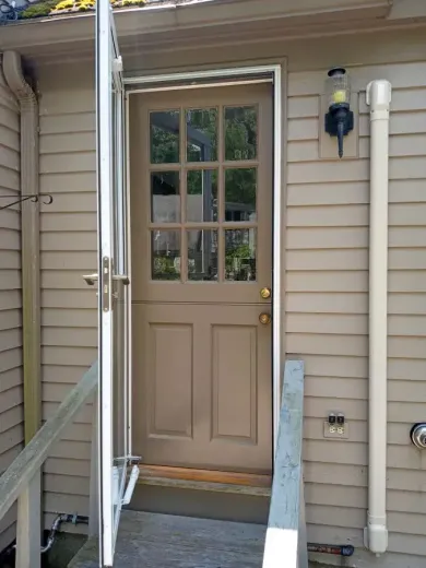 The front door of a house has the number 314 on it