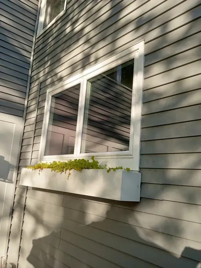 New vinyl windows for this home in South Portland, Maine.