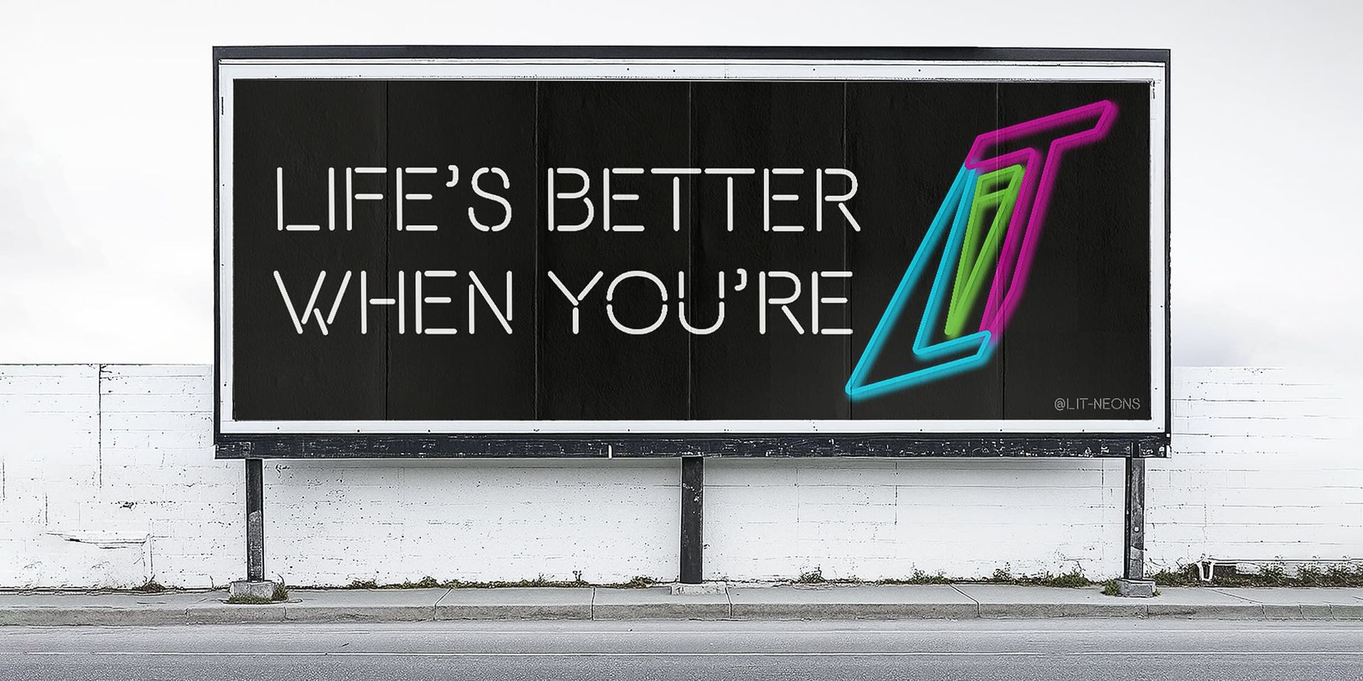 Billboard reading “LIFE’S BETTER WHEN YOU’RE” beside a neon multicolor L logo on a white wall