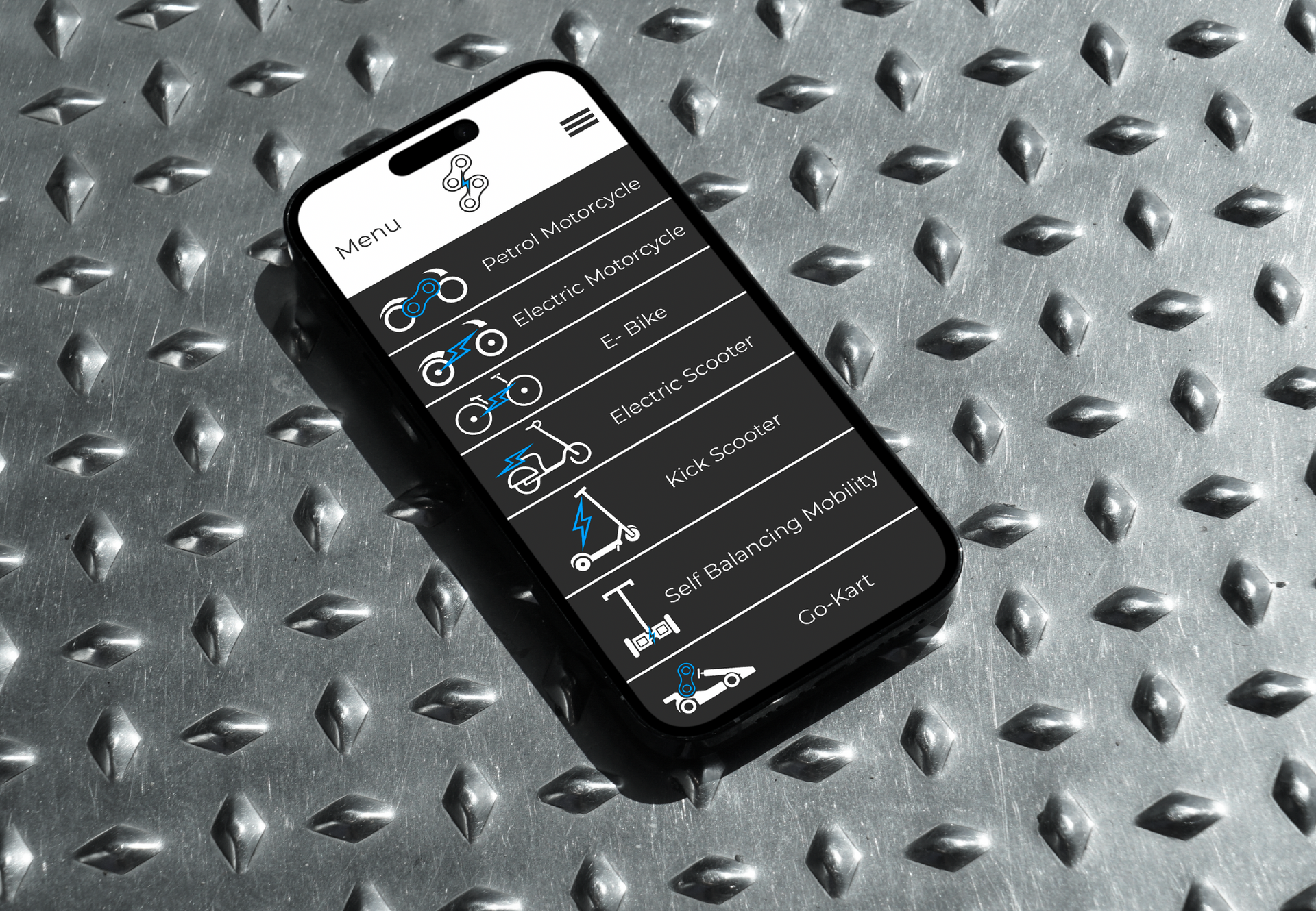 Custom website and social media icons designed for IGNITE Powersports shown on a phone screen in a real world setting