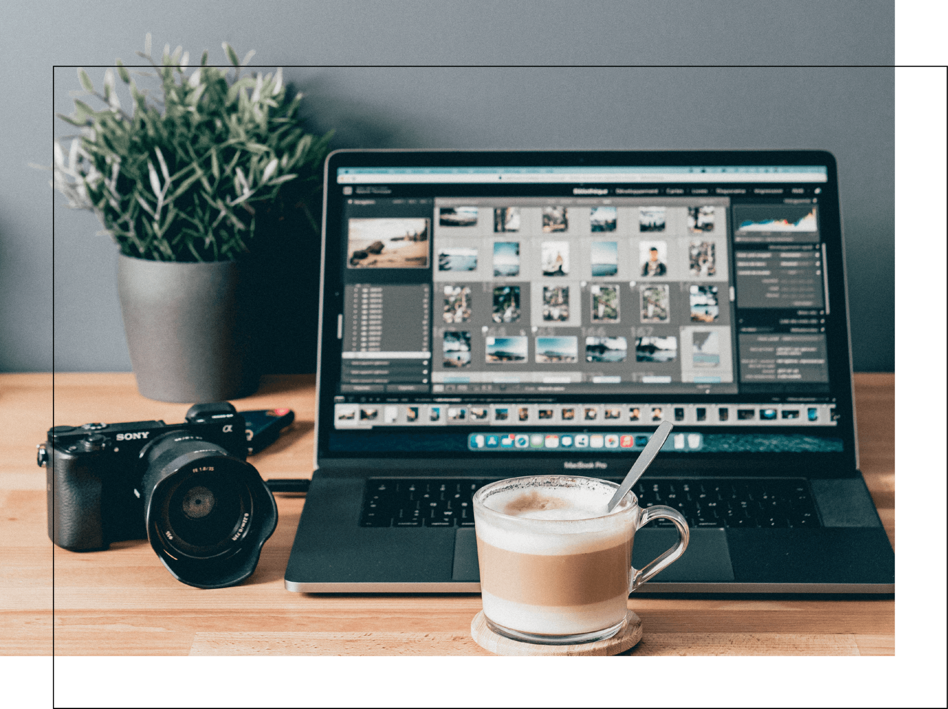 A laptop with a cup of coffee next to it