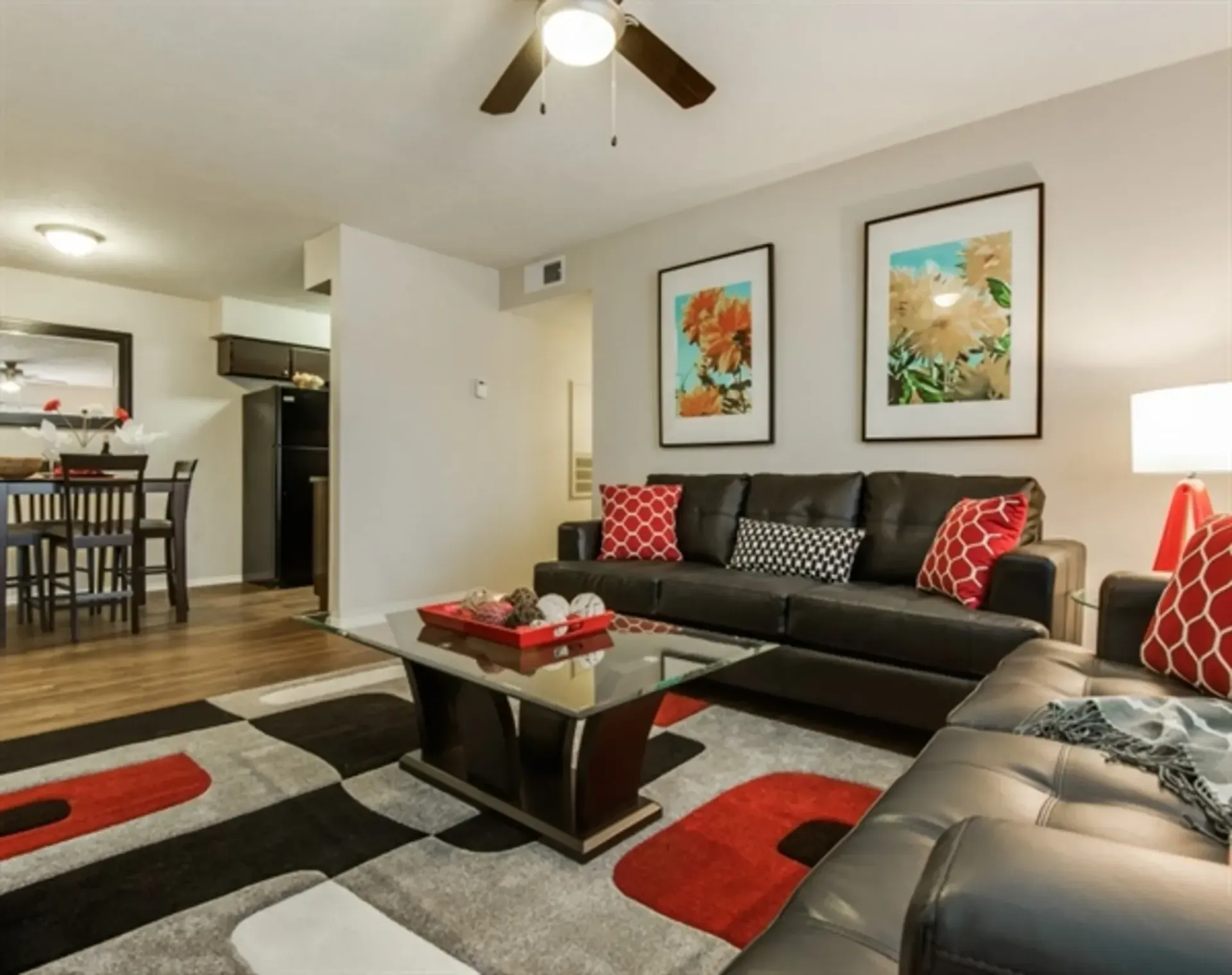 photo of a living room with ceiling fan alternate angle