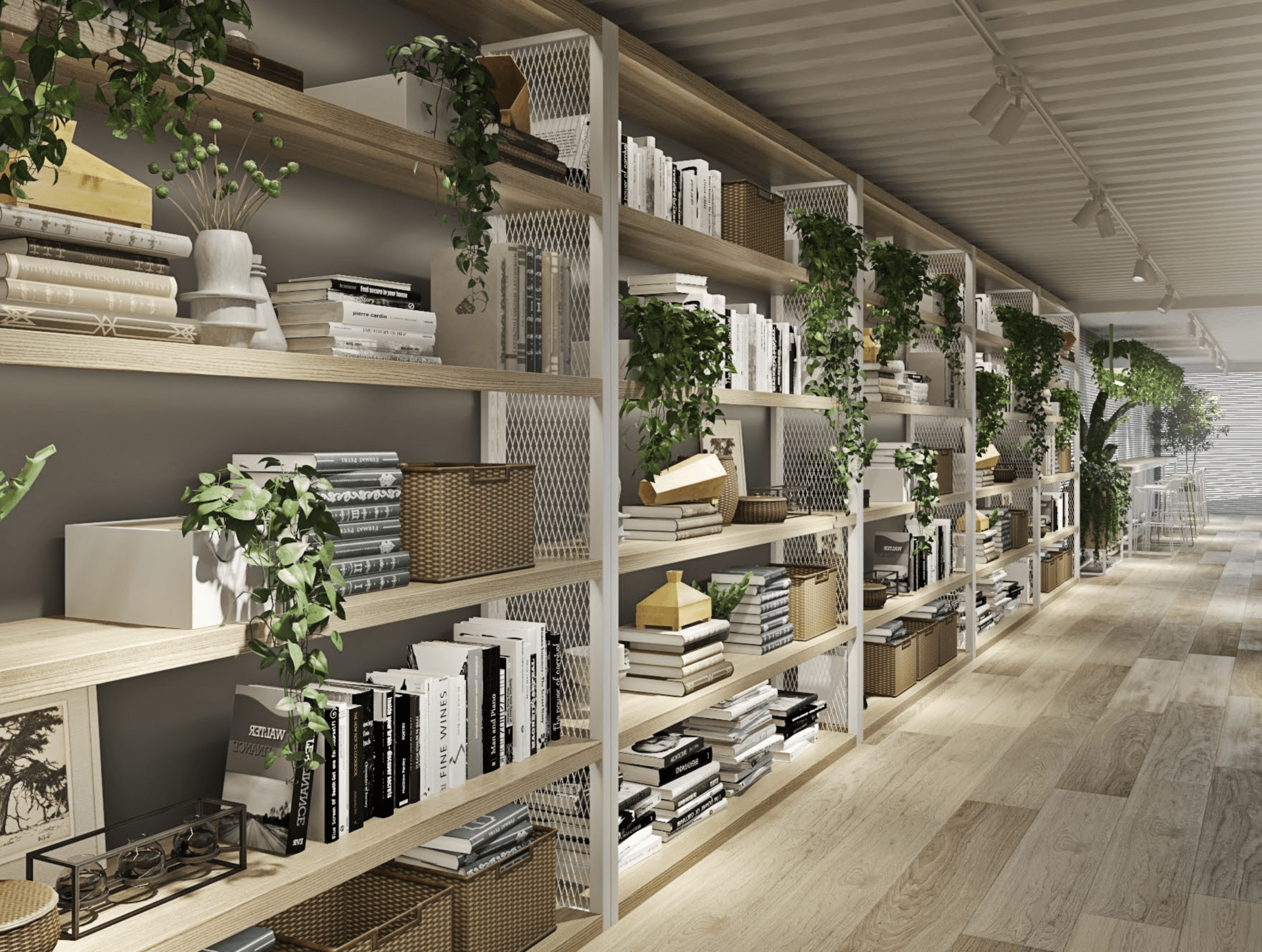 Long hallway with light wood shelves, full of books and plants.