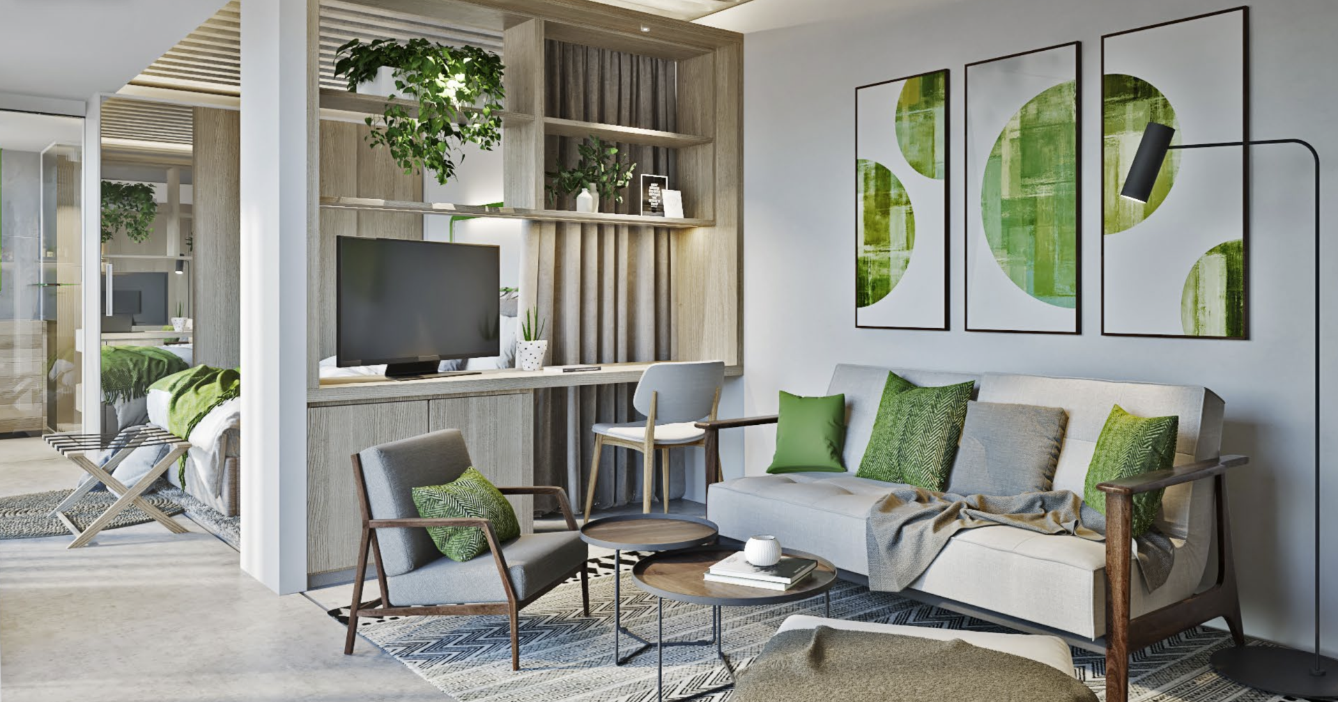 Cozy living room with green accents: couch, armchair, desk, artwork, and plants.