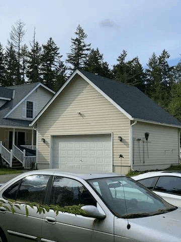 New asphalt shingle roof installed on detached garage