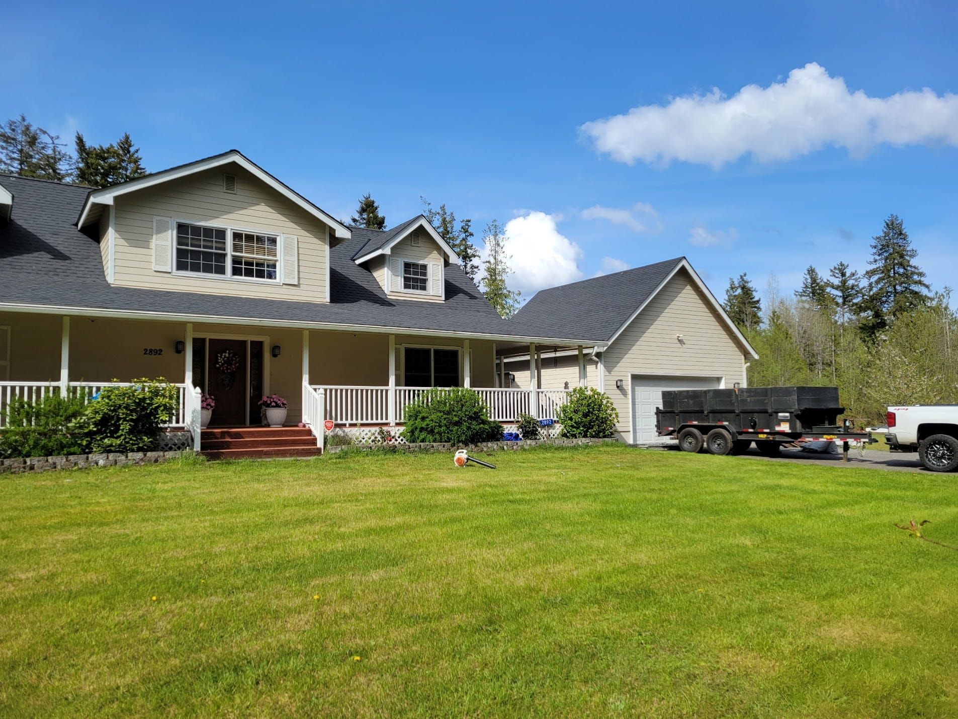 Completed roof replacement on a large residential home