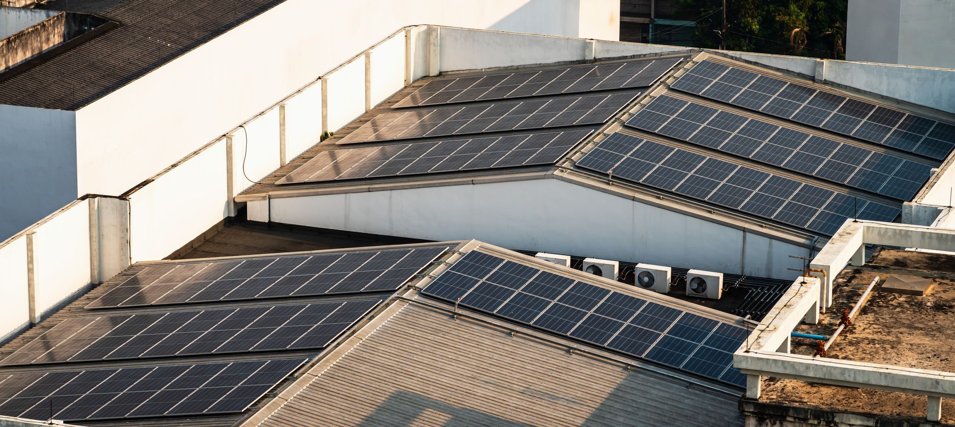 A roof with a lot of solar panels on it