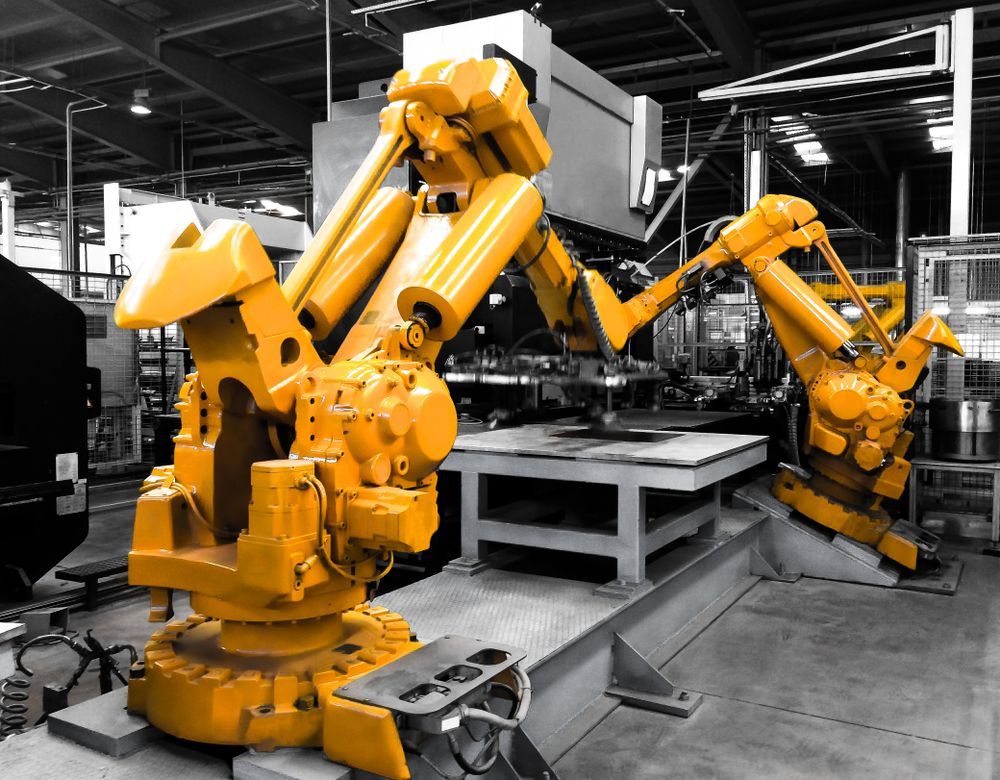 A Bunch of Yellow Robots Are Working in a Factory — Search Partners in Melbourne, VIC