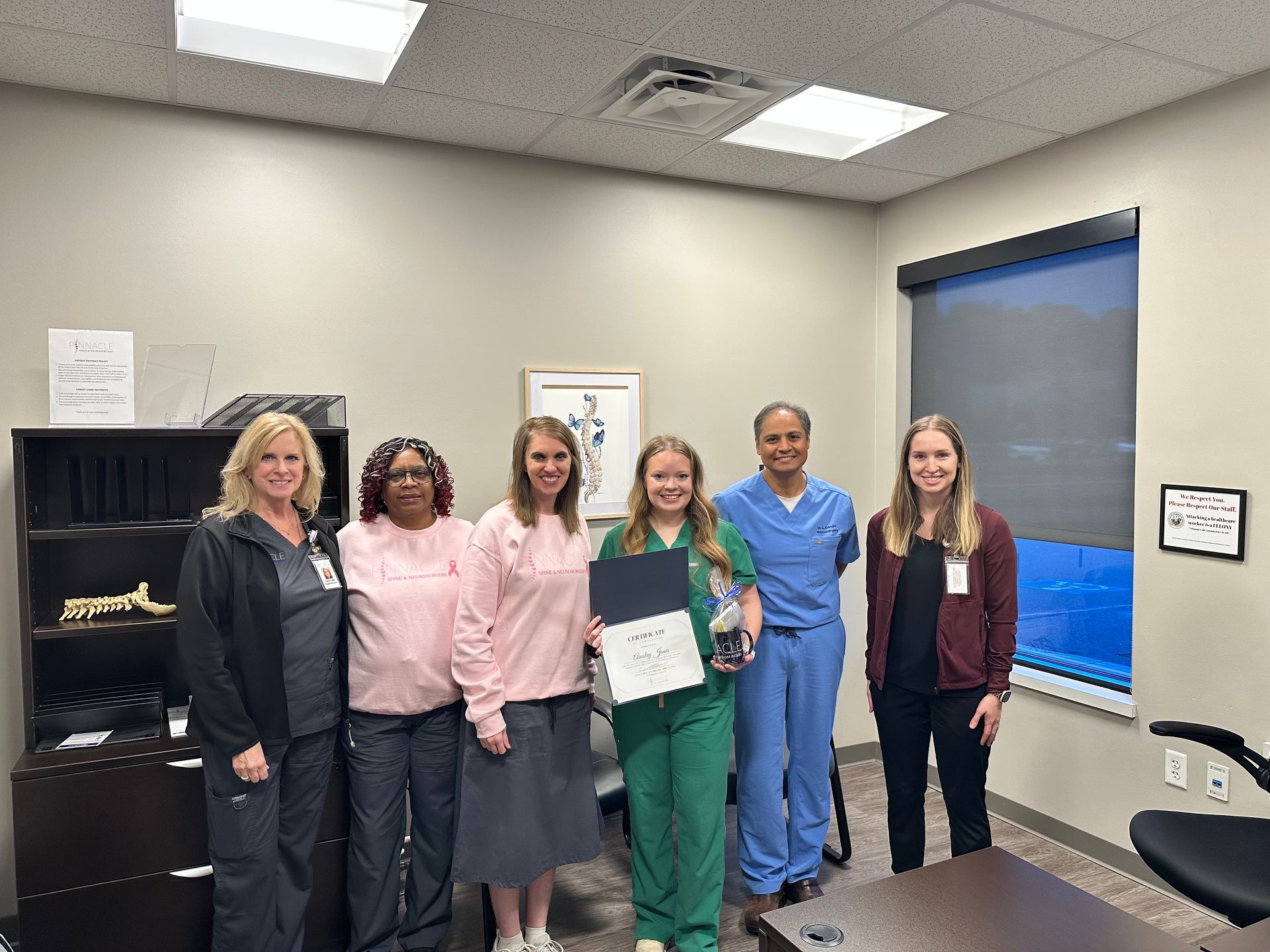 Pinnacle Spine & Neurosurgery team with student, Ainsley Jones.