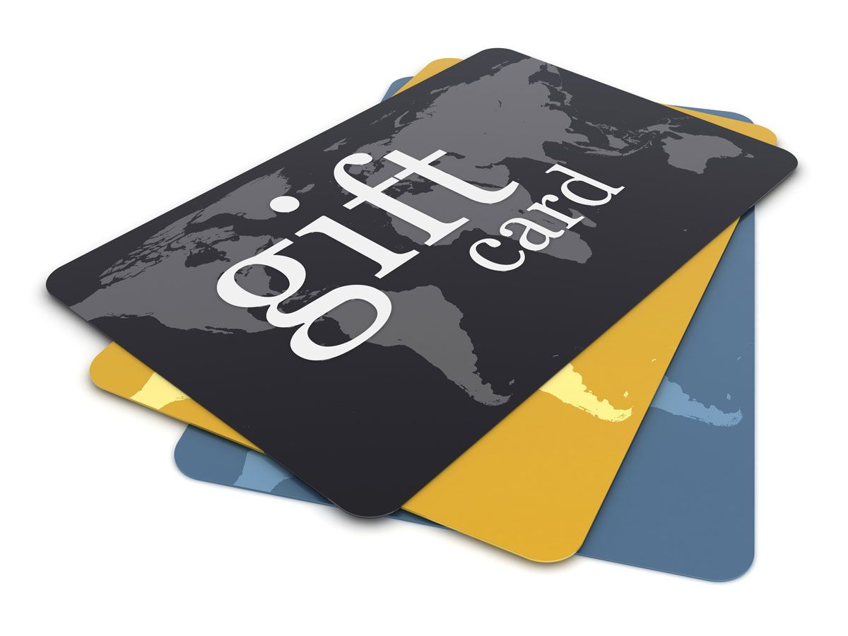 Three gift cards are stacked on top of each other