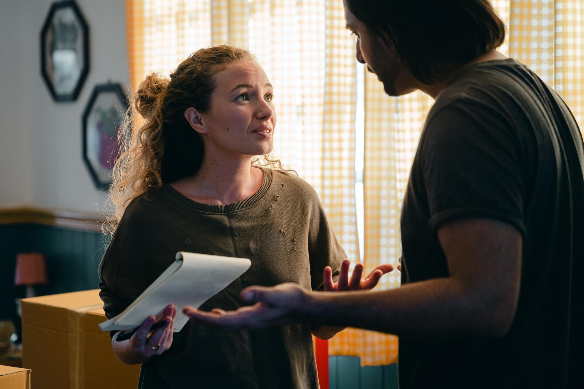 couple fighting over luck of organization and paying late bills