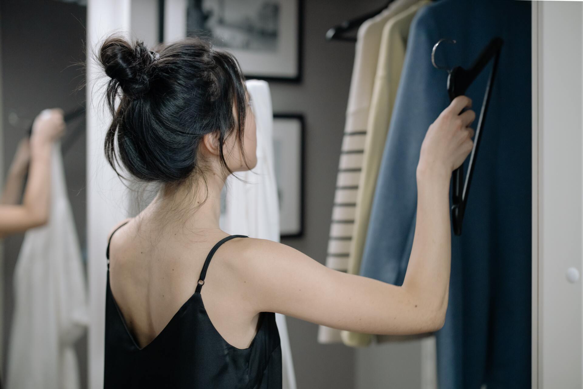 Women organizing a closet