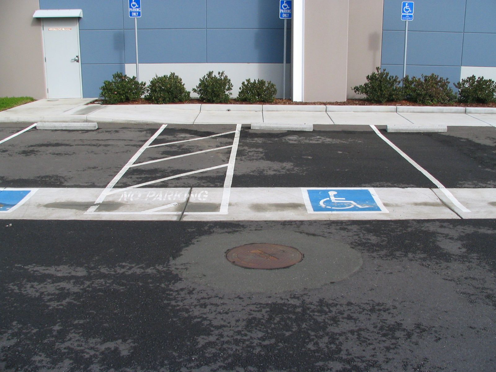 a parking lot with a handicapped parking spot