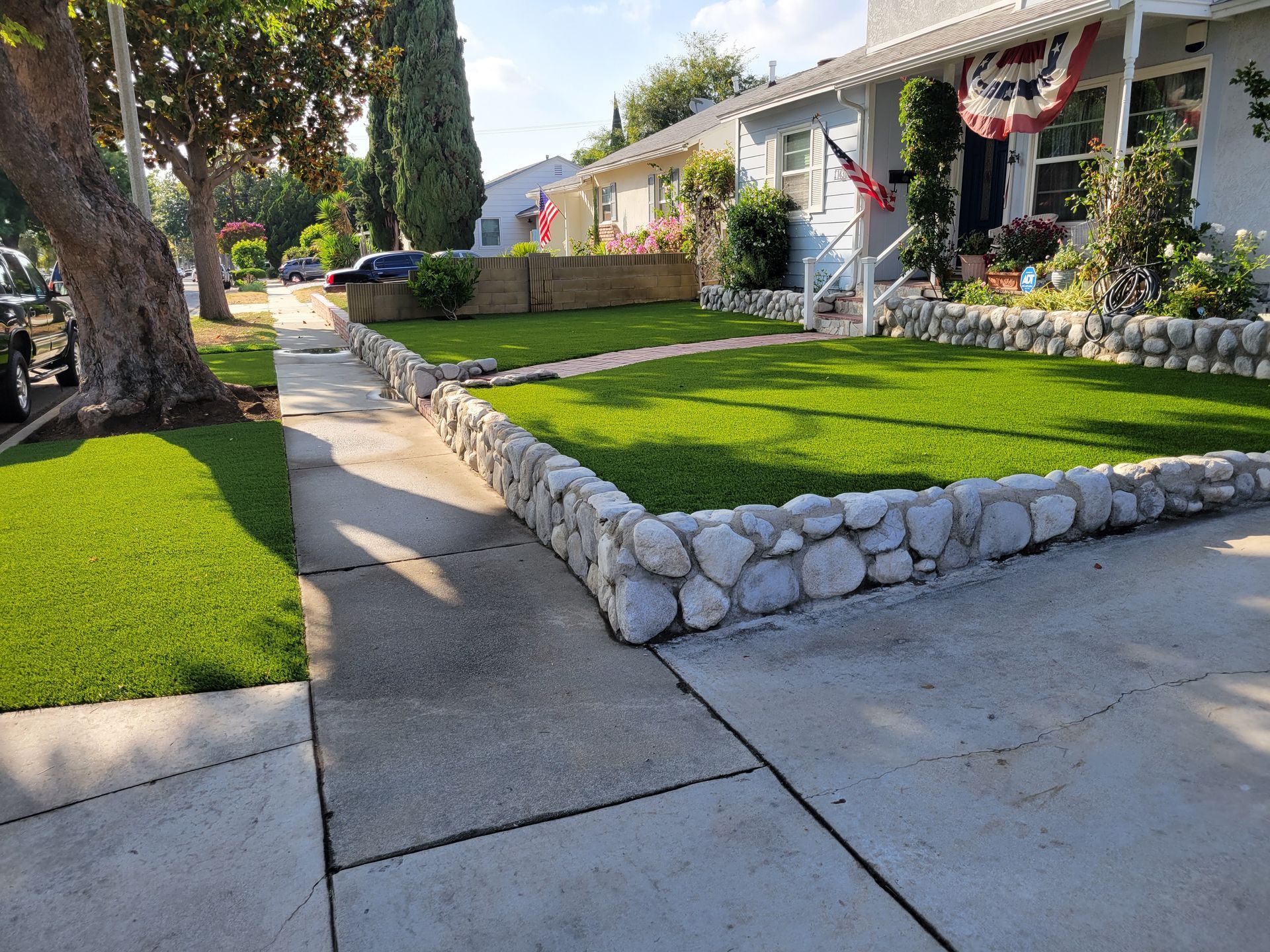yard after artificial grass installation