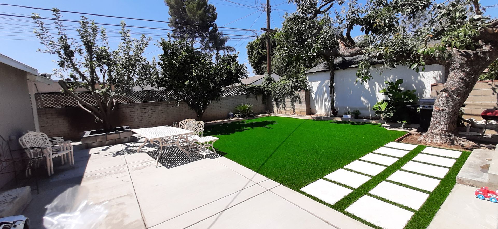 beautiful artificial grass back yard