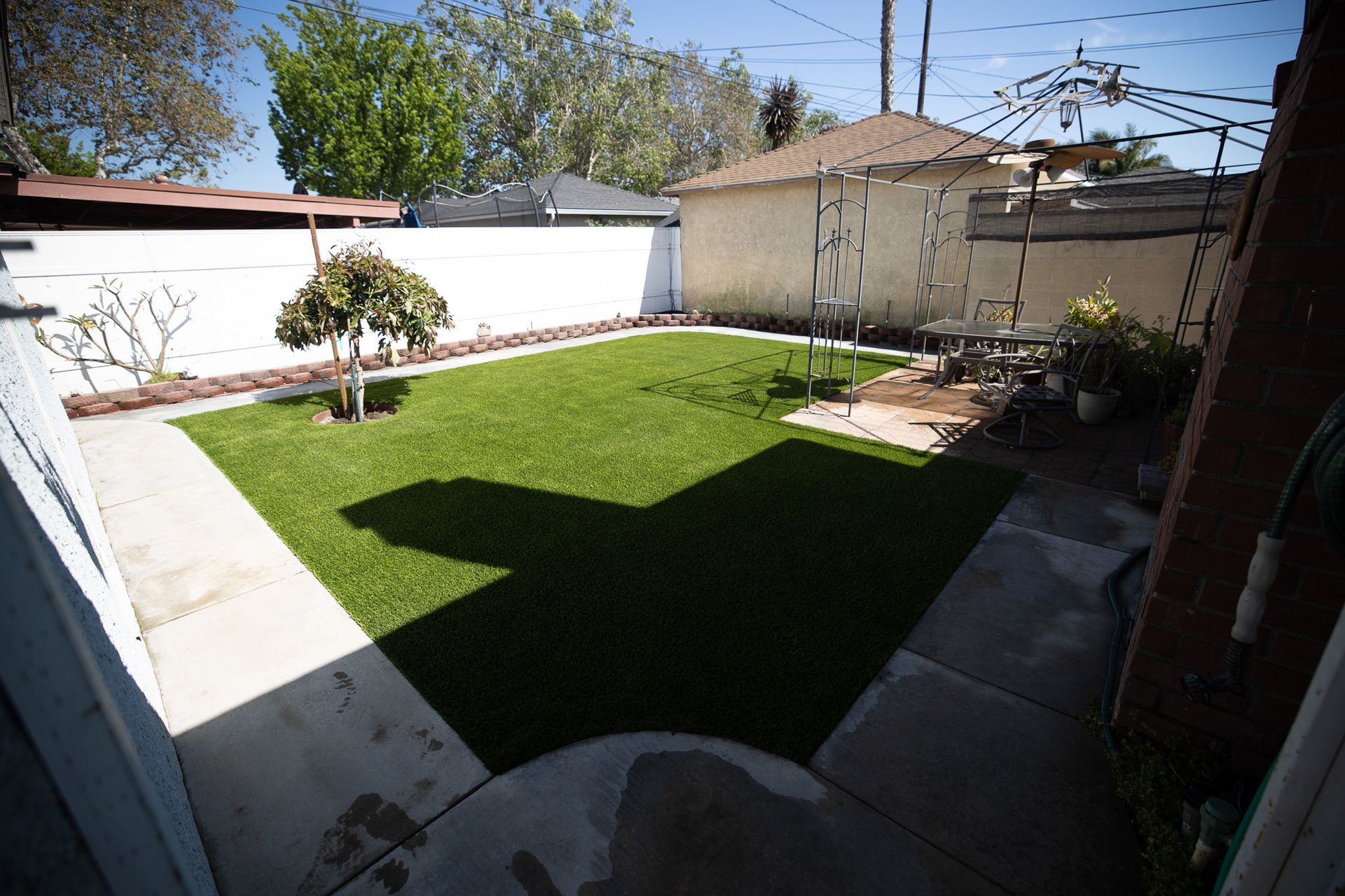 back yard after installing fake grass