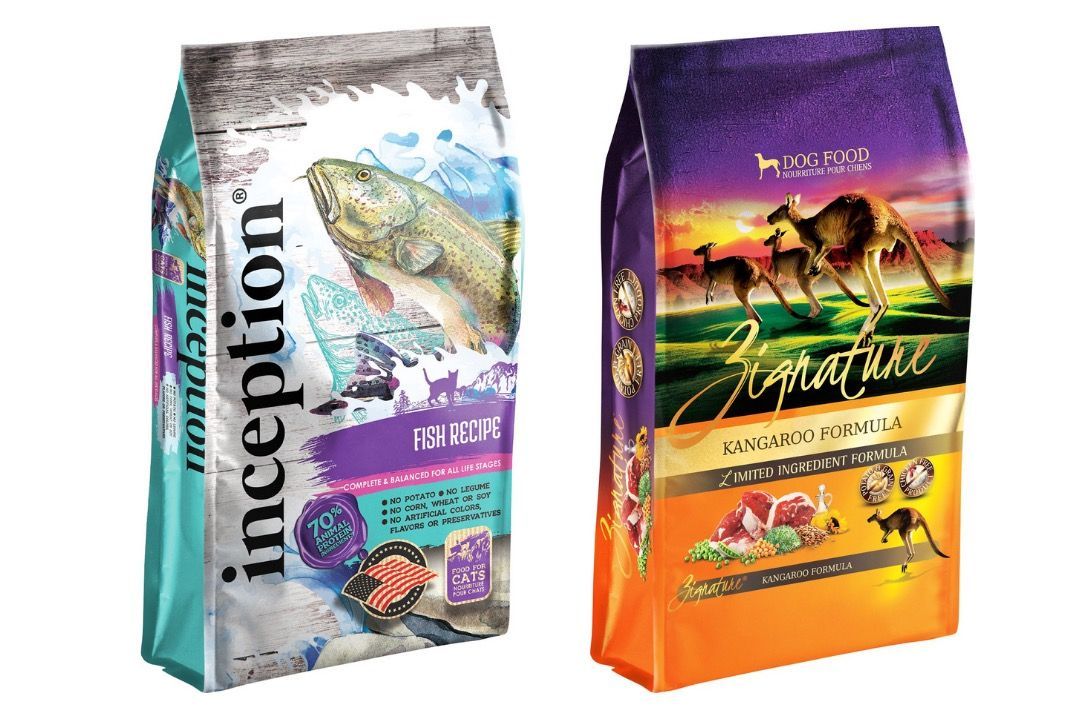 Three bags of whey protein are sitting next to each other on a white background.