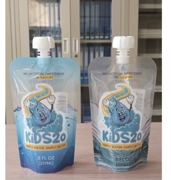 A group of baby food pouches sitting next to each other on a table.