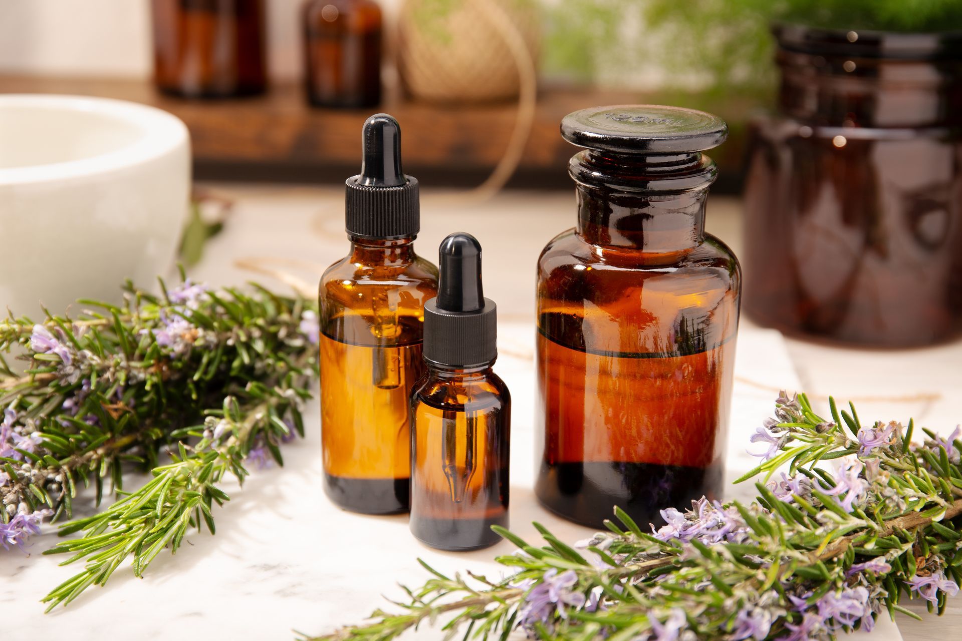 Assorted CBD bottles displayed on a rustic wooden slab at a shop counter
