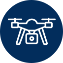 White drone icon on a dark blue background.