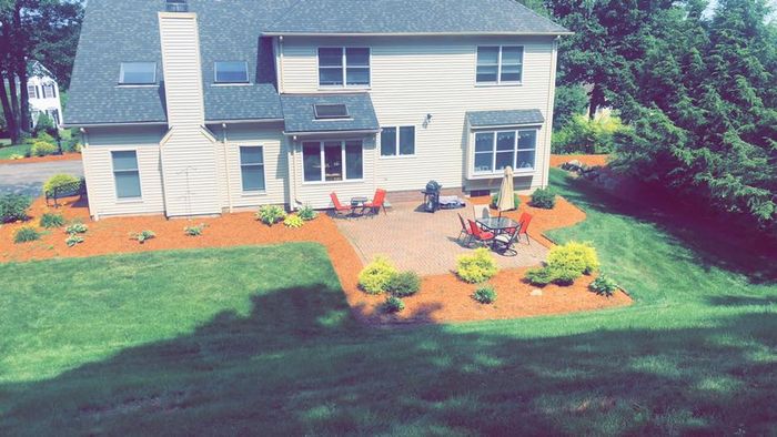 Garden With Table And Chair — Shrewsbury, MA — Warren Landscaping Garden With Table And Chair — Shrewsbury, MA — Warren Landscaping