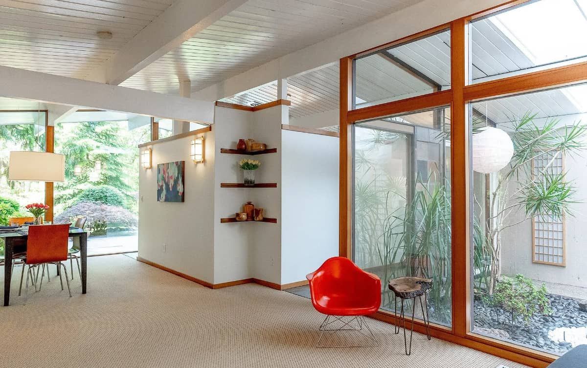 a post and beam construction interior of a mid-century modern home.