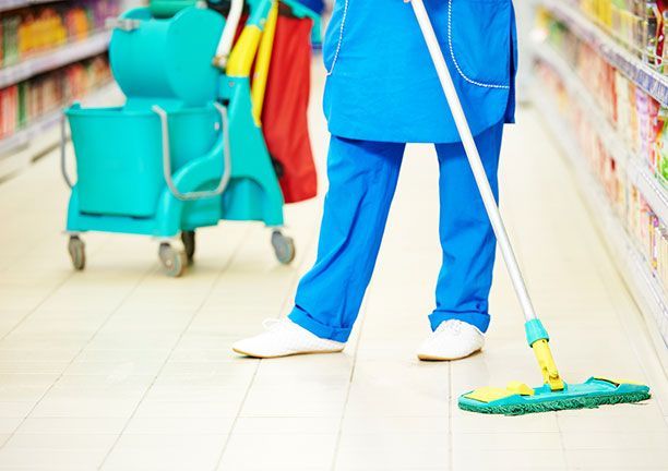 Person Cleaning the Floor — Wedgefield, WA — Unicorn Cleaning & Gardening Services Pty Ltd