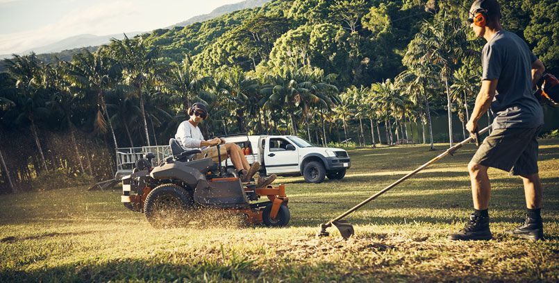 Men Trimming a Lawn — Wedgefield, WA — Unicorn Cleaning & Gardening Services Pty Ltd