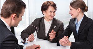 Advice being given to a lady via a female interpreter