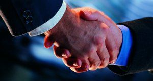 Close-up of a handshake