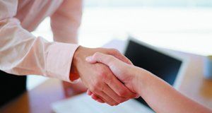 Close-up of a handshake