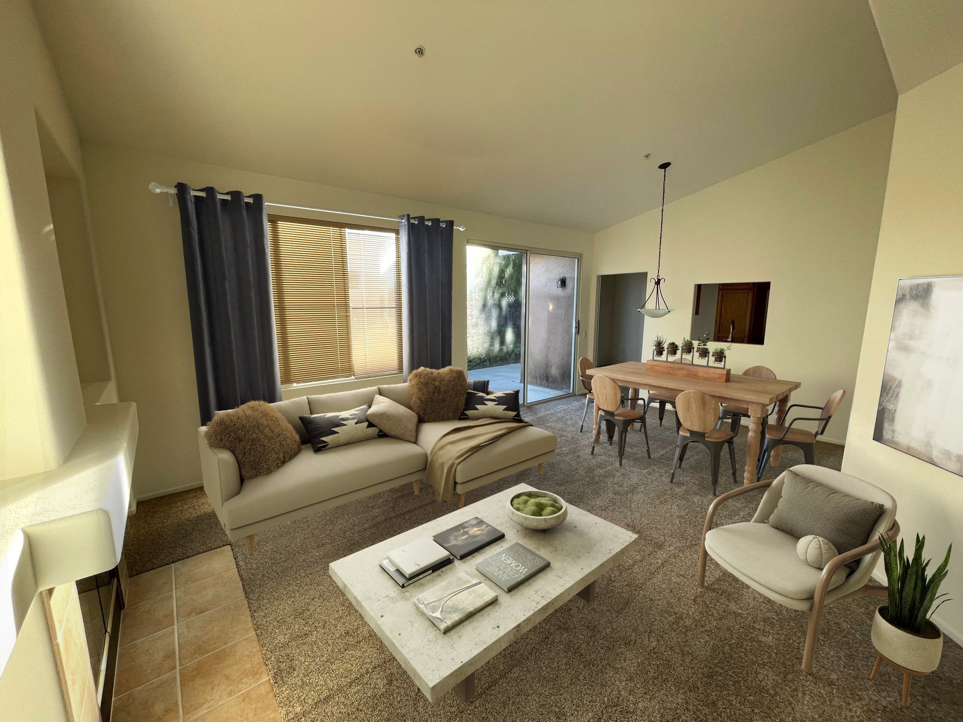 A living room with a couch , table , chairs and a coffee table