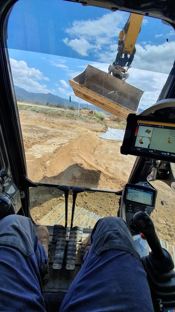 A Person is Sitting in the Driver's Seat of a Bulldozer — Advanced Civil Earthworks In Koah, QLD