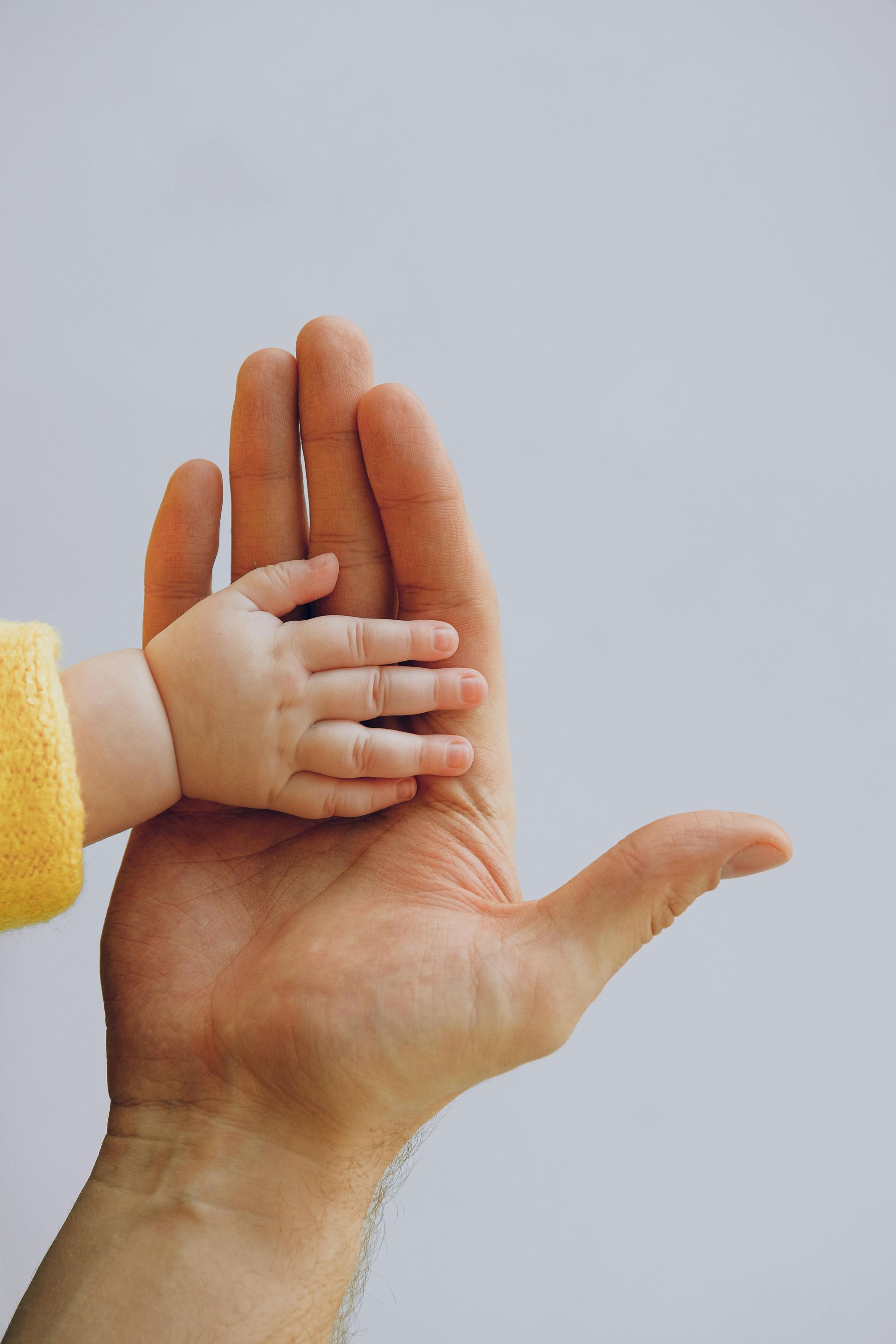 Babymassage, hand ouder en baby