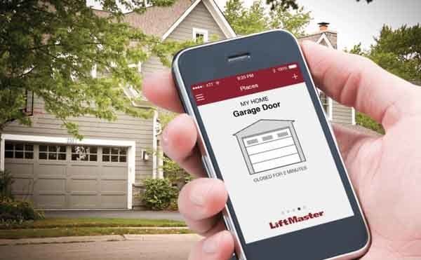 Mobile phone controlling a garage door opener through a smart app