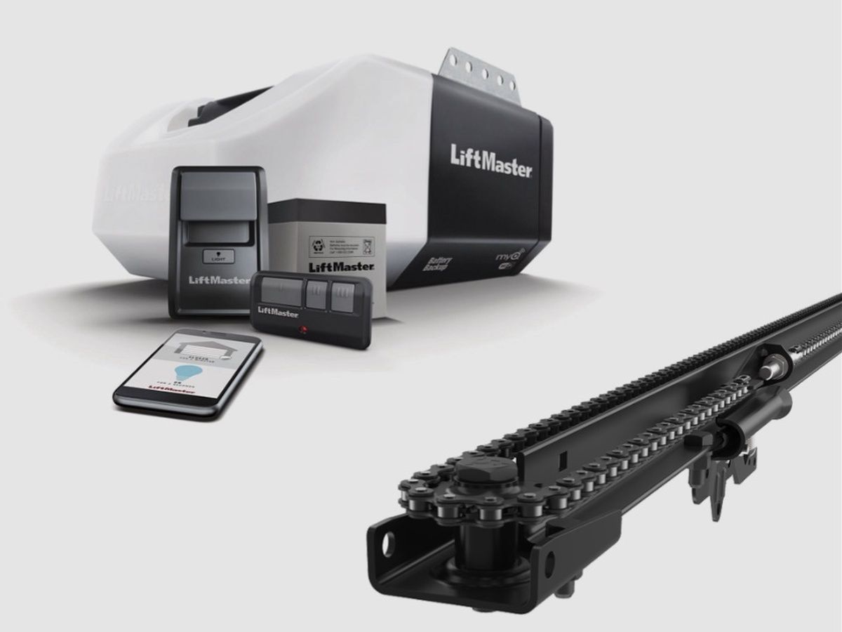 Garage door opener system with chain drive rail, wall control, and accessories