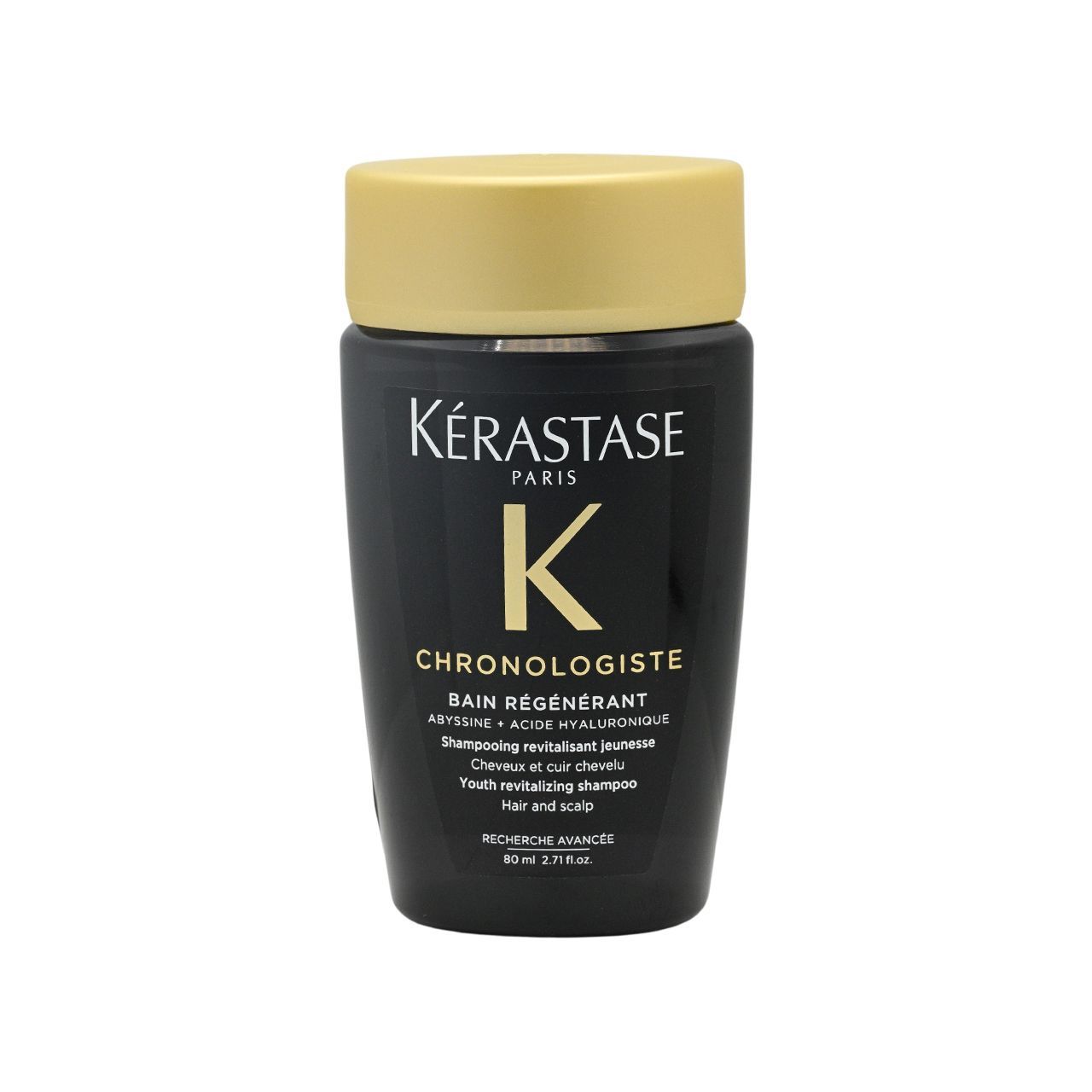 帶有金色瓶蓋的黑色 Kérastase Chronologiste 洗髮精瓶。