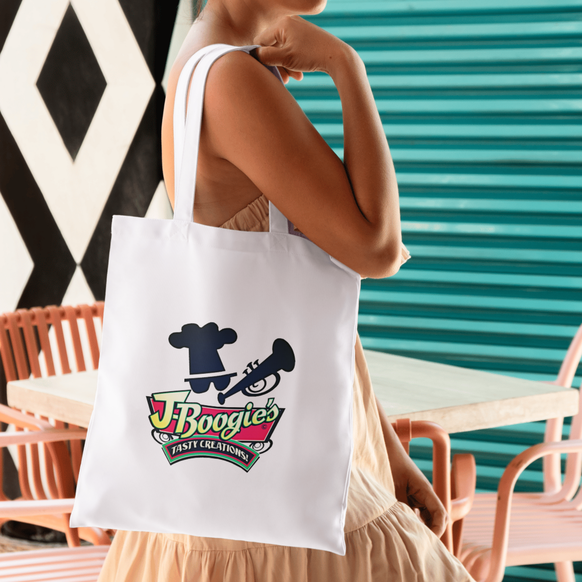 J-Boogie’s Tasty Creations branded merchandise, including hats and t-shirts, available for BBQ enthusiasts.