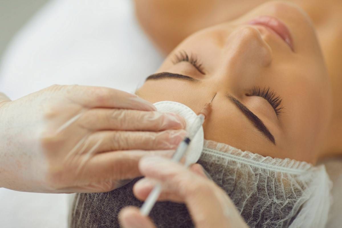 A client receiving Boxox injections to reduce forehead wrinkles near Lexington, and Richmond, Kentucky (KY)