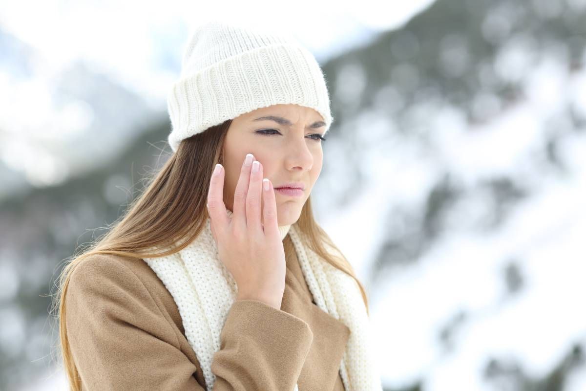A woman with dry skin in winter seeking treatment near Lexington, Kentucky (KY)