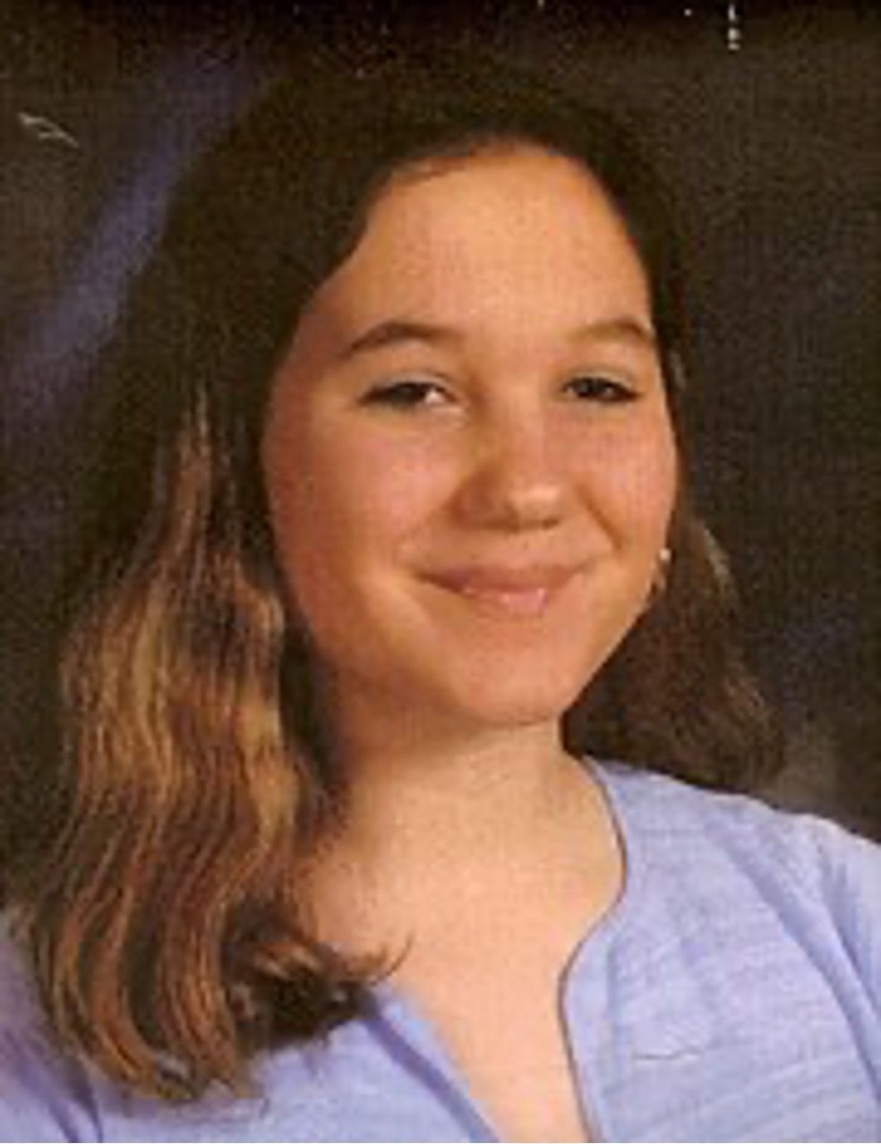 Kacie Woody in a blue shirt