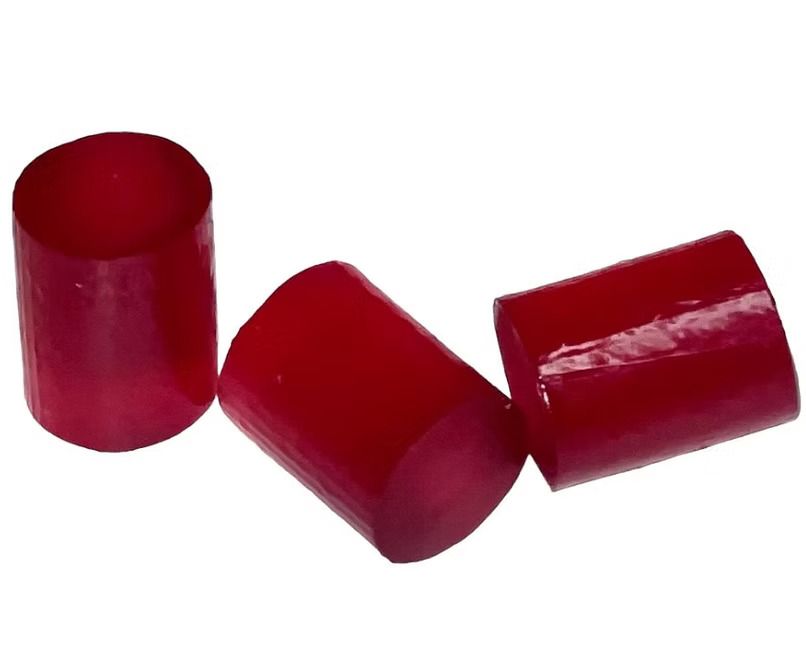 Three red cylinders are stacked on top of each other on a white background