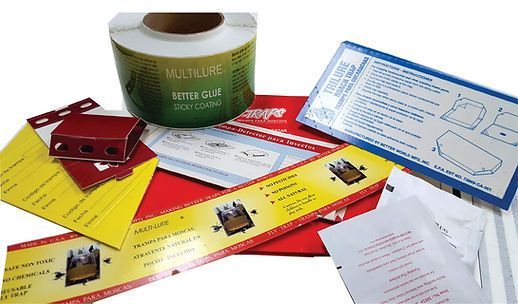 A roll of multilure super glue is sitting on top of a table