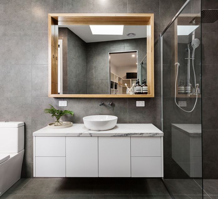 A Kitchen With White Cabinets And A Black And White Checkered Floor — Smart Tiles In Kempsey, NSW
