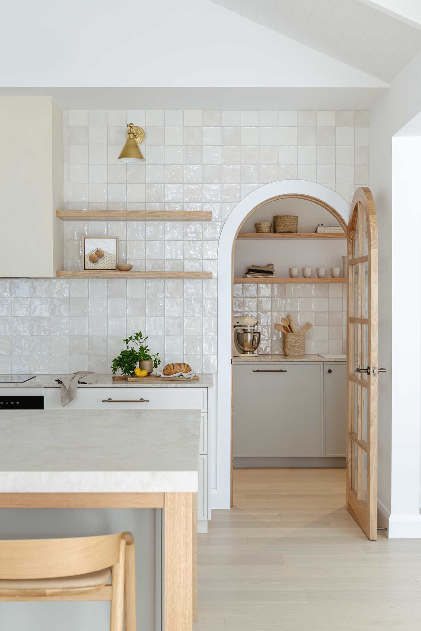A Kitchen With White Tiles And Wooden Shelves — Smart Tiles In South Kempsey, NSW