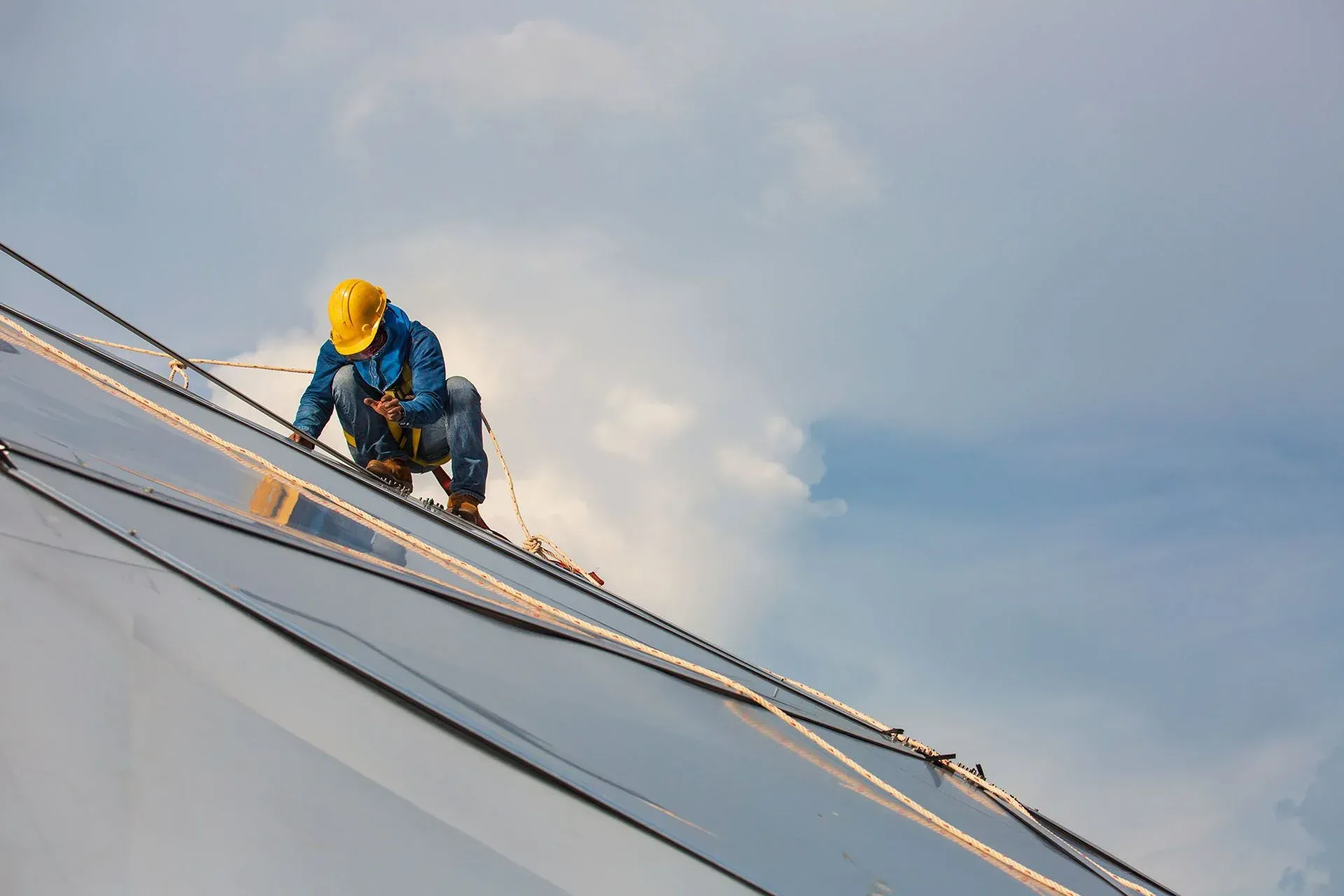 worker doing roof maintenance