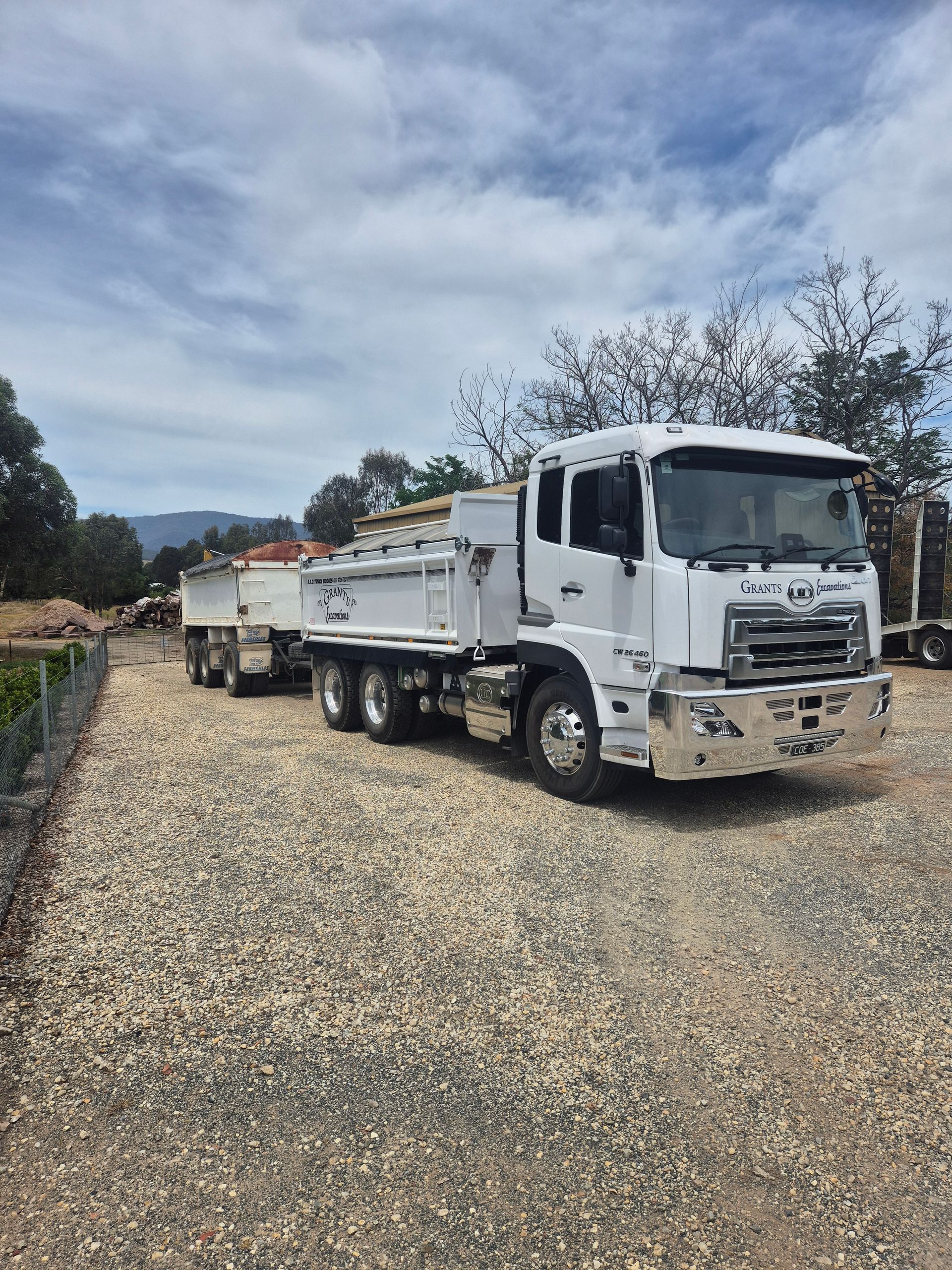 A White Truck Is Parked On A Dirt Road — Grants Excavations In Osbornes Flat, VIC