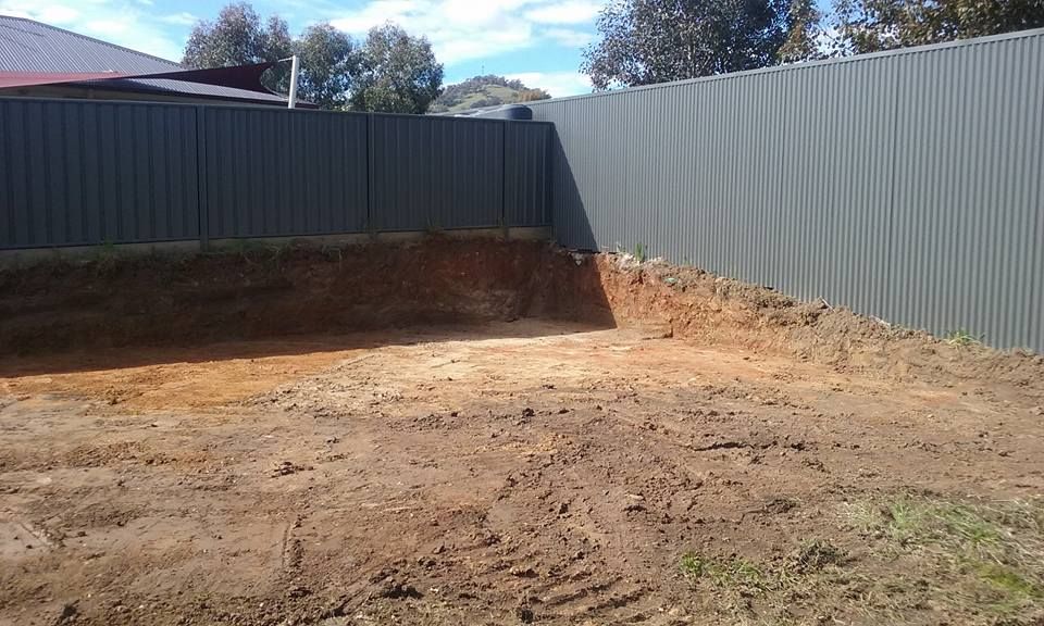 A Dirt Field With A Fence In The Background — Grants Excavations In Osbornes Flat, VIC
