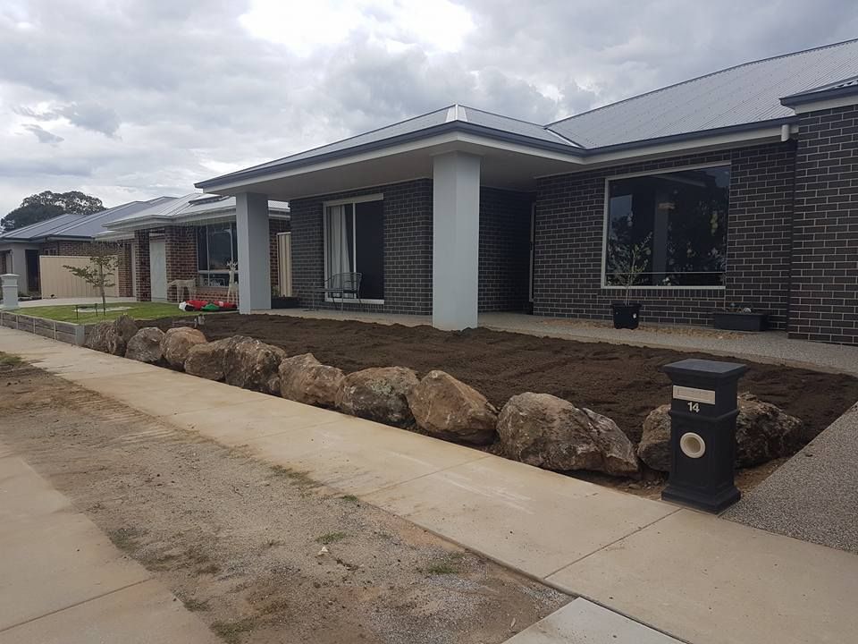 A Brick House With A Mailbox In Front Of It — Grants Excavations In Osbornes Flat, VIC