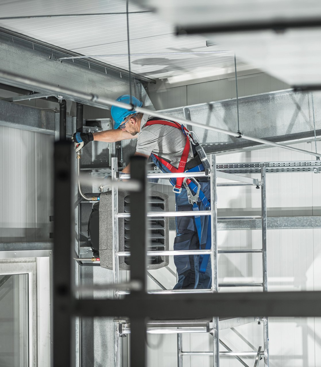 Man instaling a Heating unit